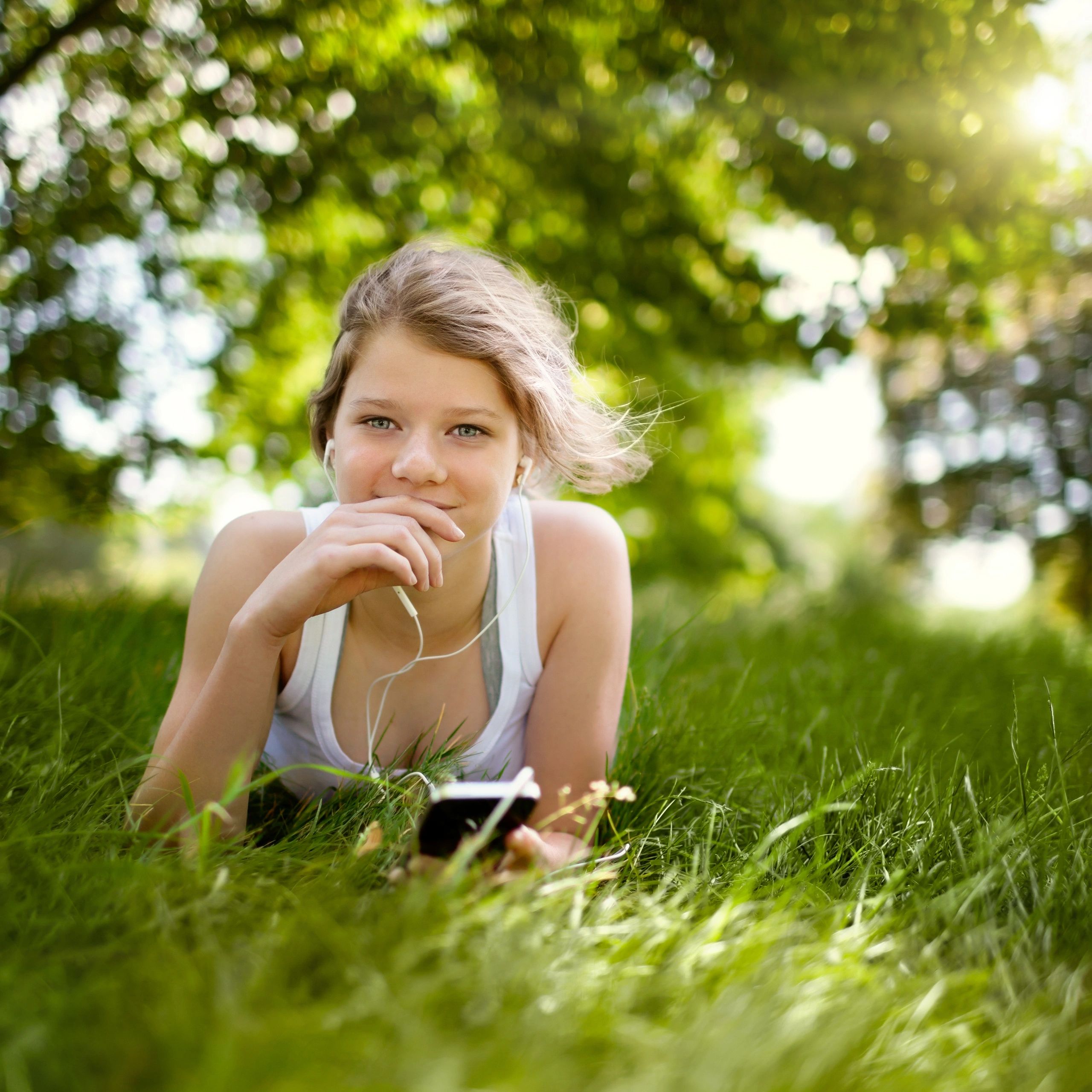 Portrait of a young adult in a park