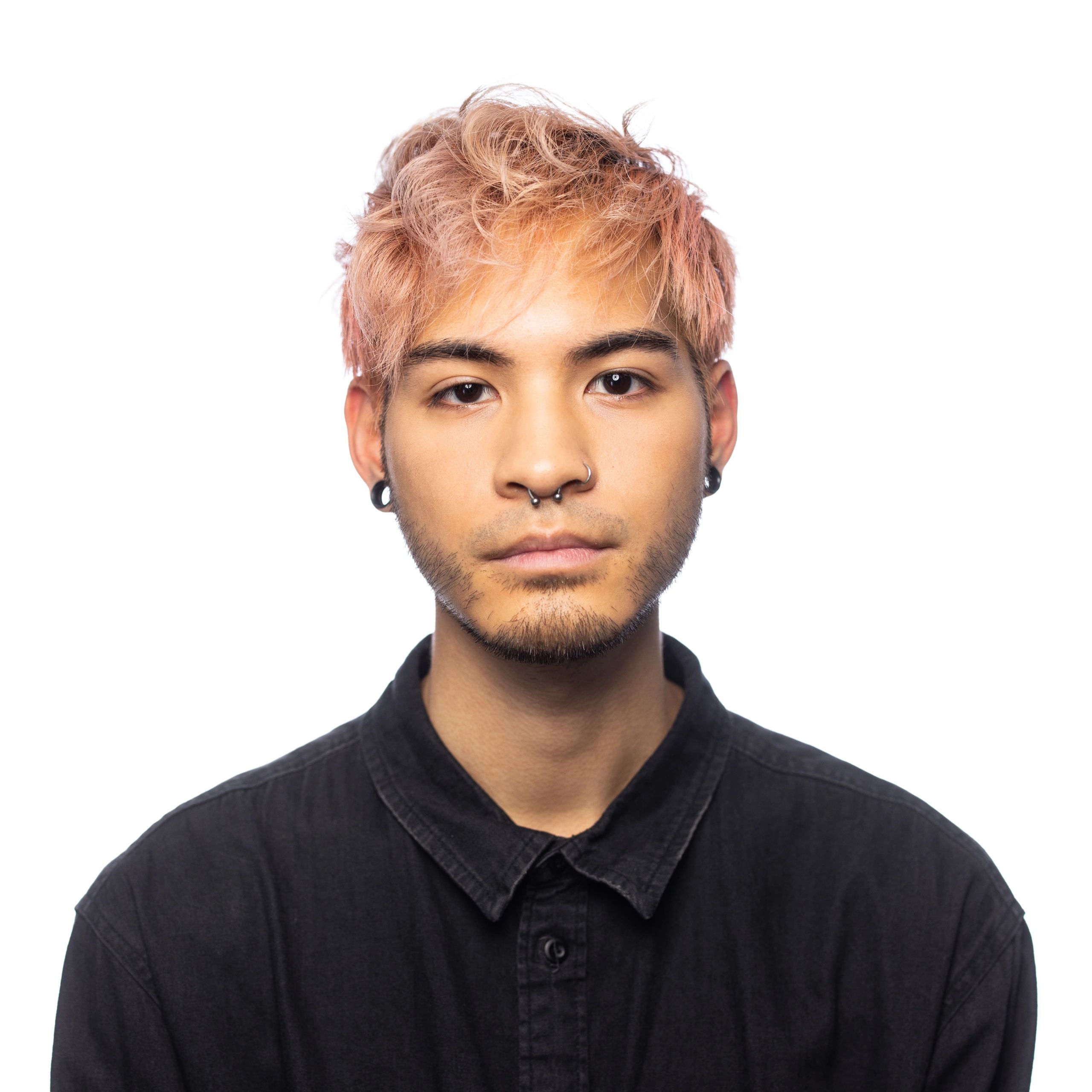 Portrait of a partnerships lead in a studio headshot