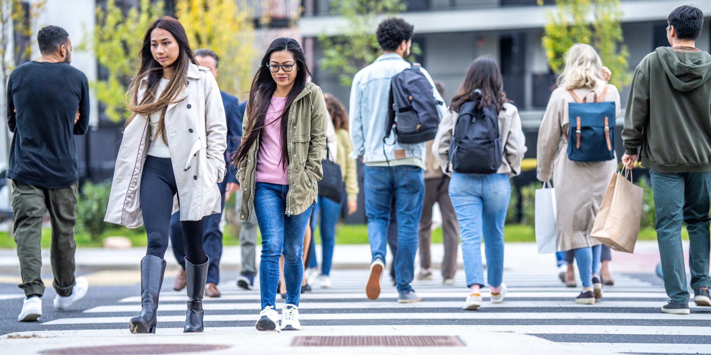 Students exploring a city street together, looking for style inspiration